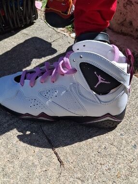 Jordan White and Pink High-Top Basketball Shoe